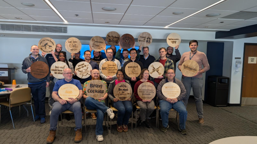 The TSO showing off signs they made during the TSO retreat